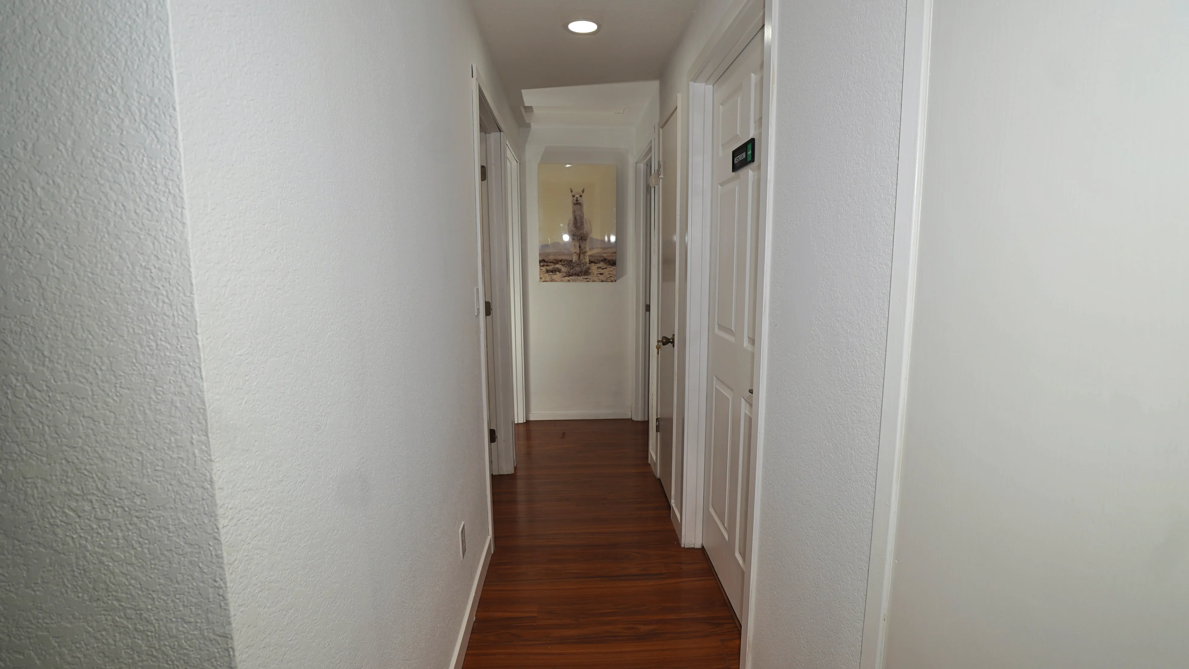 Hallway to private bedrooms